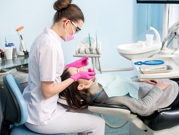 Dental hygienist doing a dental cleaning