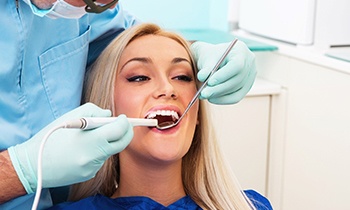 woman visiting dentist checkup