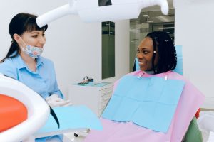 Woman at dentist for dental implant consultation