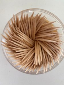 Containers full of toothpicks